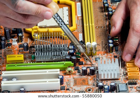 Process of repair of the electronic device close up