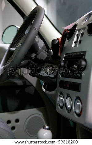 saloon car with the steering wheel and gear