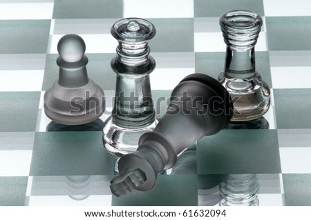 chess pieces made of glass