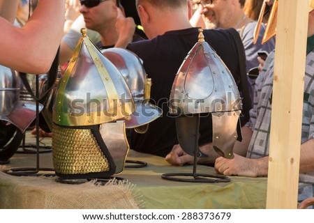 MOSCOW, RUSSIA - JUNE 7, 2015: Ancient Roman helmets sold in the market at Times and Epochs: Rome historical festival