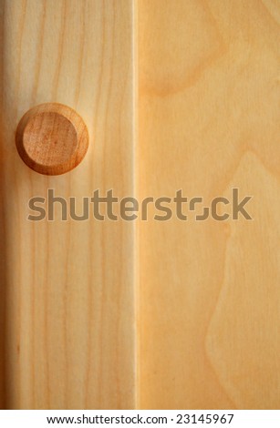 Round door knob on a wooden door