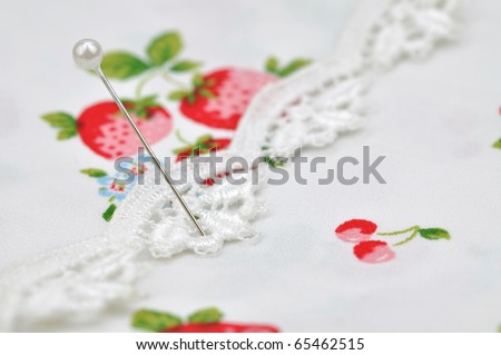 Straight pin in lace and cloth
