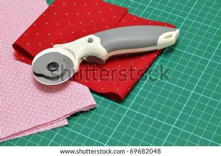 Rotary cutter and fabrics on a cutting mat