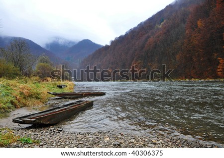 Wood raft in fall landscape