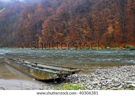Wood raft in fall landscape