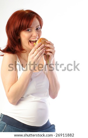 pregnant woman eating. stock photo : pregnant woman