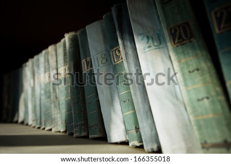 old books on the shelf in the library