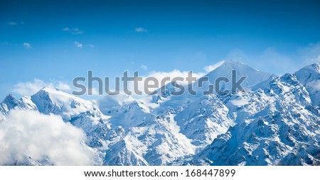 high mountain and snow peaks