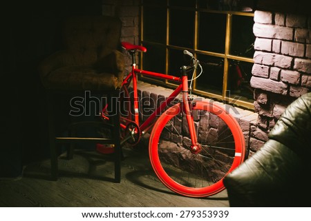 Red stylish bike hipster cafes in the evening. interior cafe