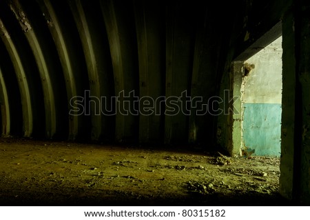 abandoned military hangar for vehicles of the Cold War