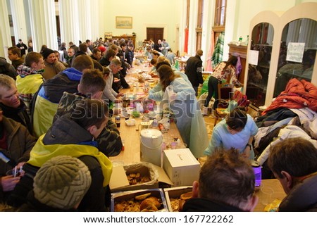 KIEV, UKRAINE-DECEMBER 5, 2013: Distribution of free food for the protesters in the building of the Kiev city hall.