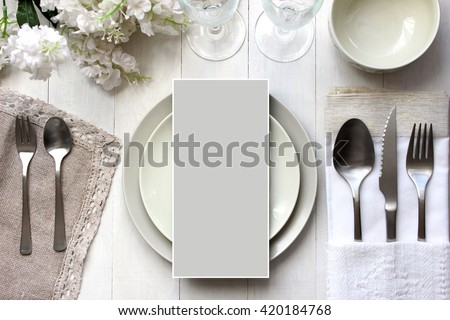 Table card mockup, menu mockup.  Vintage fashion photography. Wedding dinner design. Place card, reserved card. Beautiful dishware, traditional style.