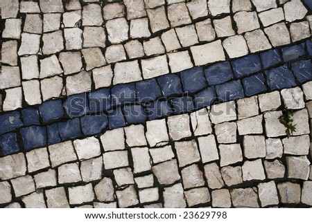 Portuguese typical sidewalk stones, blue and white