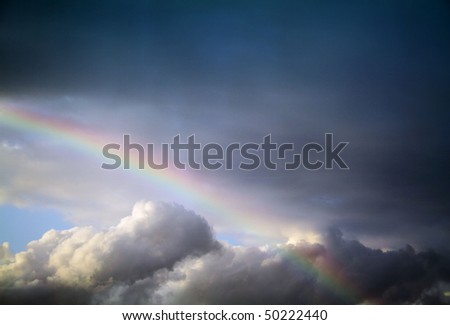 White Clouds and cool rainbow