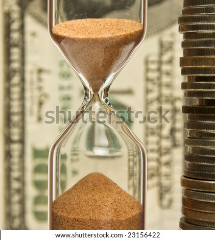 Time - money; hourglass on the background money.
