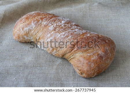 Italian bread on linen texture