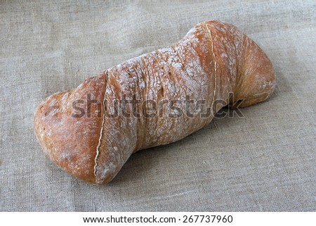 Italian bread on linen texture