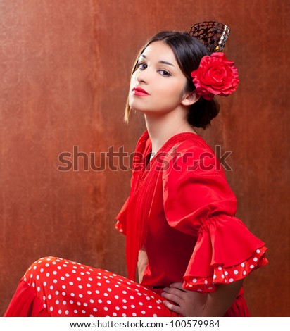 Flamenco dancer Spain woman gipsy with red rose and spanish peineta comb