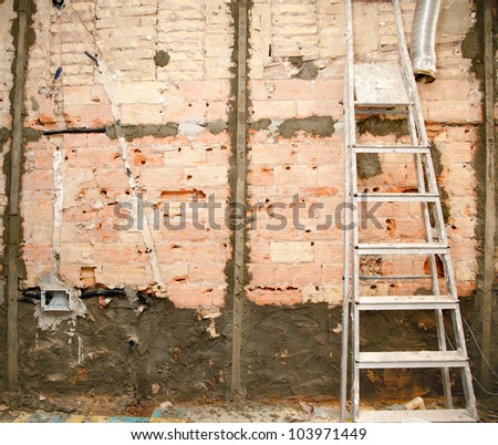 demolition before tiling in kitchen interior construction and ladder