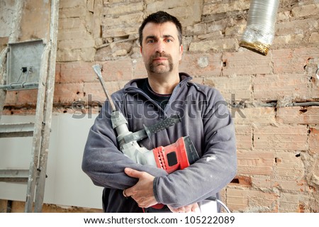 demolition hammer man mason manual worker portrait with mustache