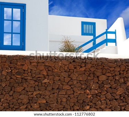 Lanzarote Playa Blanca white house and volcanic masonry in canary Islands [Photo illustration]