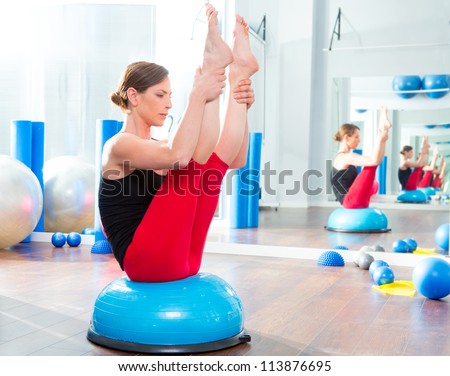 Bosu ball for fitness instructor woman in aerobics gym