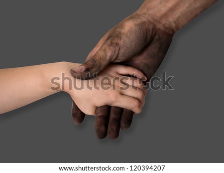 dirty man hands holding kid clean hand concept