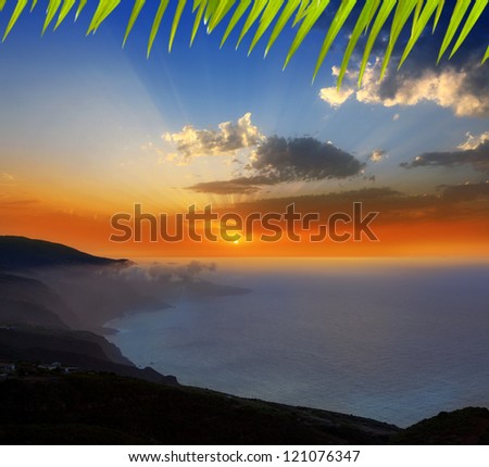 La Palma muntains sunset with orange sun in canary islands [photo-illustration]