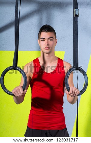 dip ring young man relaxed after workout at gym dipping exercise