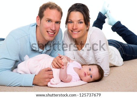 Baby mother and father happy family portrait  lying on carpet and white background