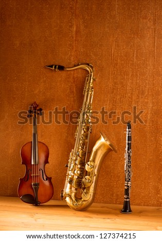 Classic music Sax tenor saxophone violin and clarinet in vintage wood background
