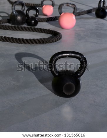 Crossfit Kettlebells Ropes In Fitness Gym Floor
