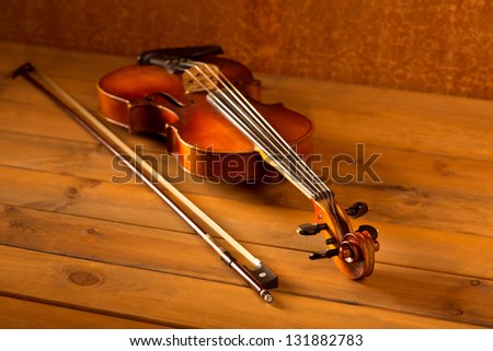 Classic music violin vintage in wooden golden background