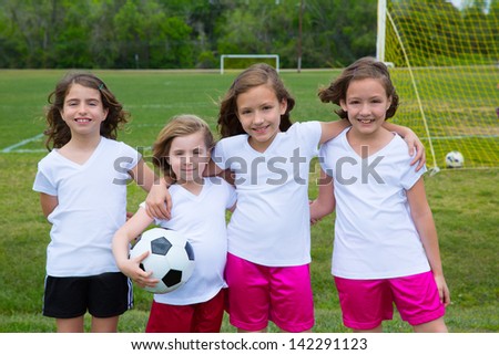Soccer football kid girls team at sports outdoor field before match