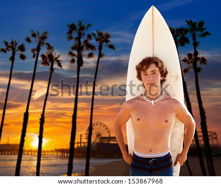 Surfer boy teenager with surfboard in Santa Monica sunset at California [photo-illustration]