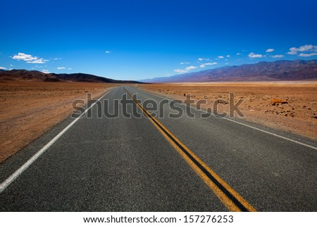 Deserted Route 190 highway in heart of Death Valley California