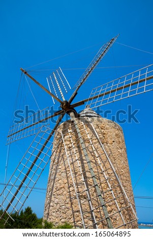 Formentera Windmill wind mill vintage masonry and wood in Mediterranean Balearic islands