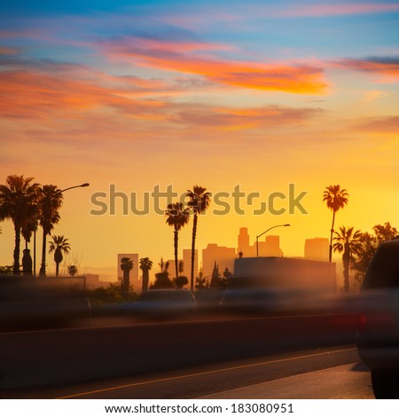 LA Los Angeles sunset skyline with traffic California from freeway