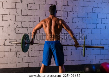 Barbell weight lifting man rear view workout gym weightlifting