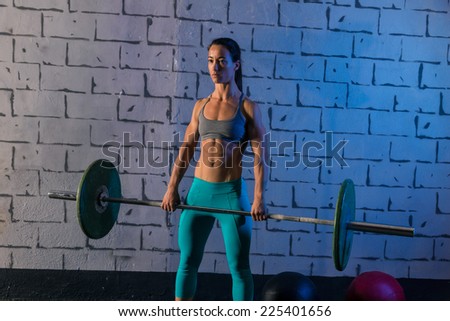 Barbell weight lifting woman workout exercise gym weightlifting
