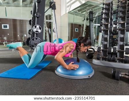 Bosu knees push up push-up woman at gym workout exercise