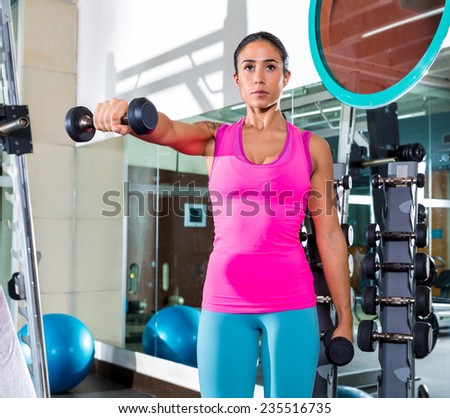 dumbbell front shoulder flies fly woman workout exercise at gym
