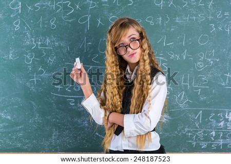 Clever nerd pupil blond girl in green board thinking student schoolgirl