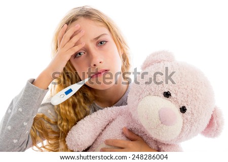 blond girl with thermometer and flu cold in pajama  grumpy face with teddy bear