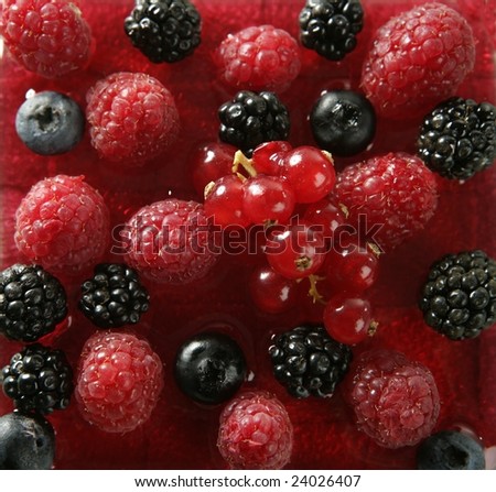Berries, mixed dessert with strawberry syrup