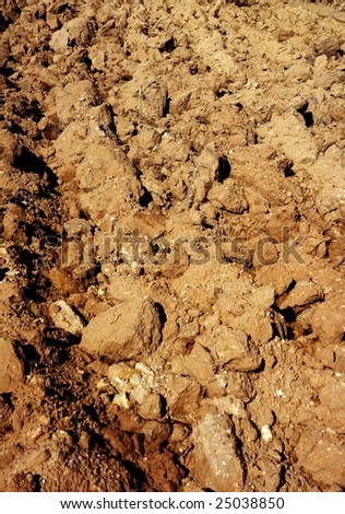 Agriculture field red clay soil texture macro
