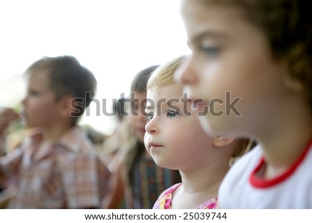 Spectator children observing spectacle. Looking at the show