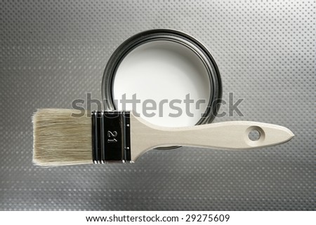 stock-photo-painter-brush-and-white-paint-tin-macro-over-silver-pattern-background-29275609.jpg