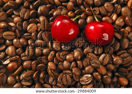 Toasted coffee beans texture and red cherry fruits