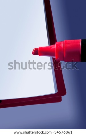Blank copy space notebook with red big pen marker over [Photo Illustration]
